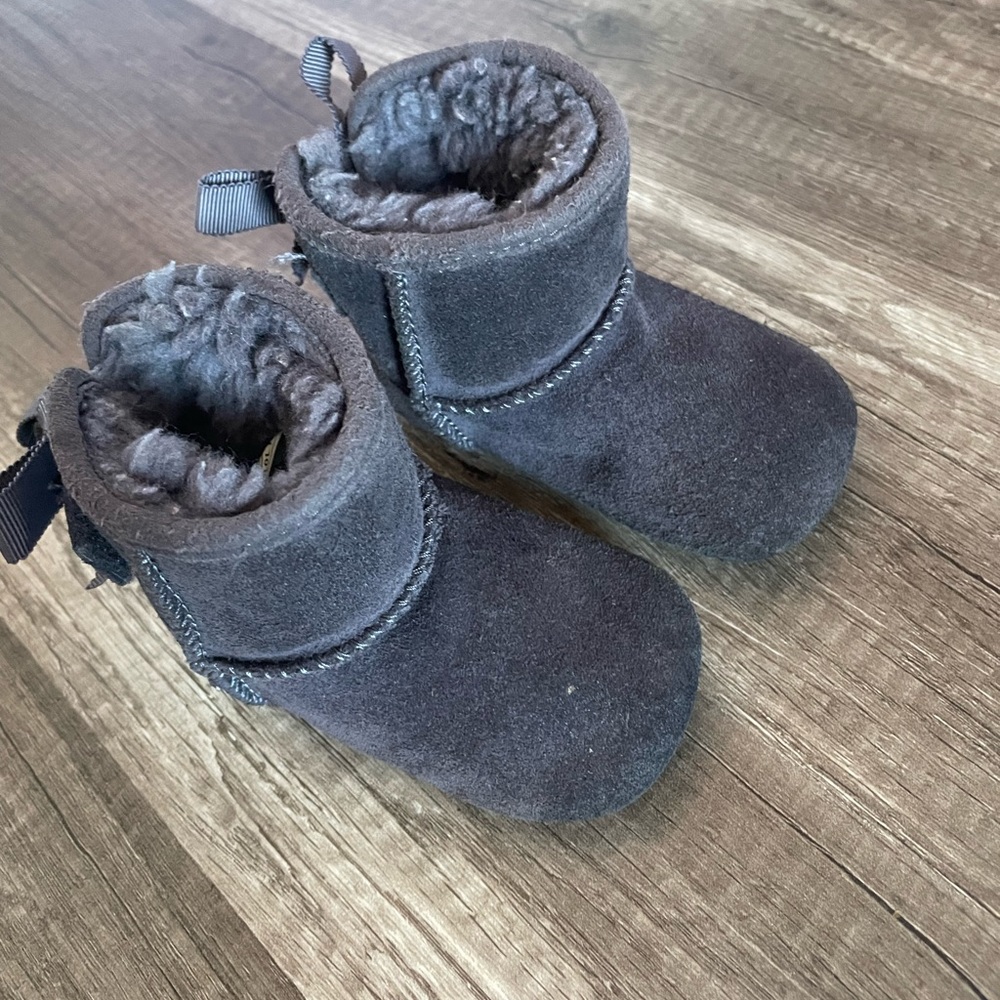 UGGS. Adorable baby girl uggs in greyish/purple color